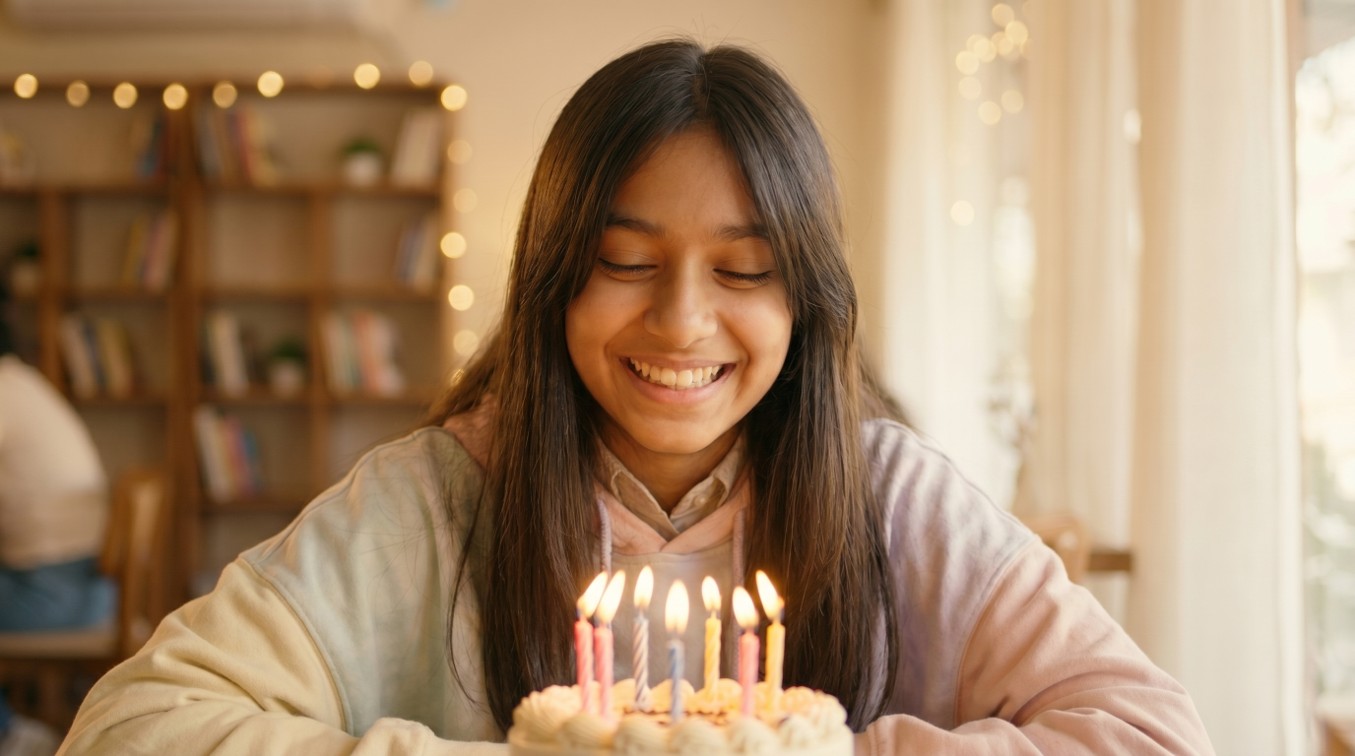 13 Birthday Celebration Song - Daughter blowing out the candles on the cake